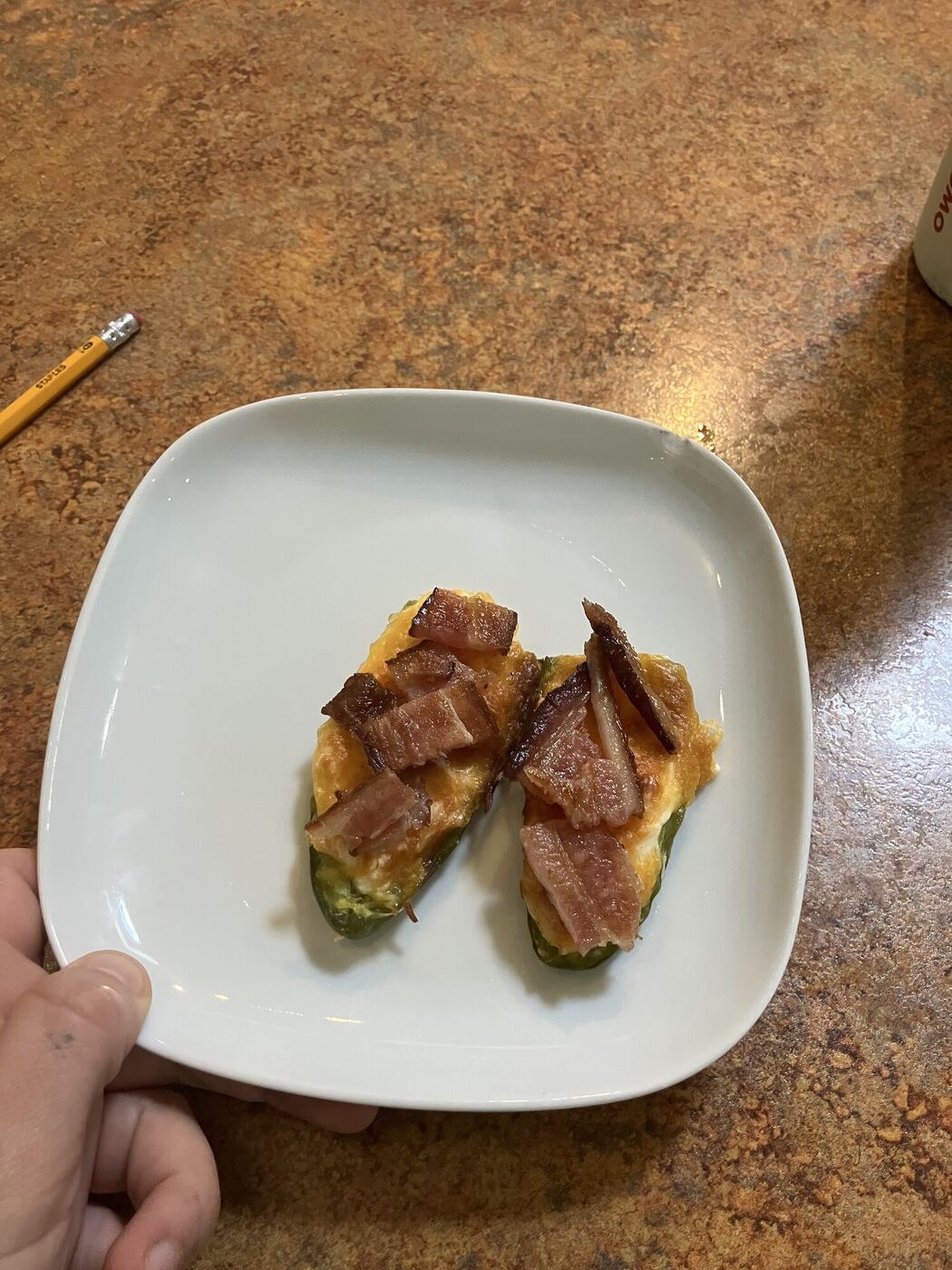 A plate of two finished poppers