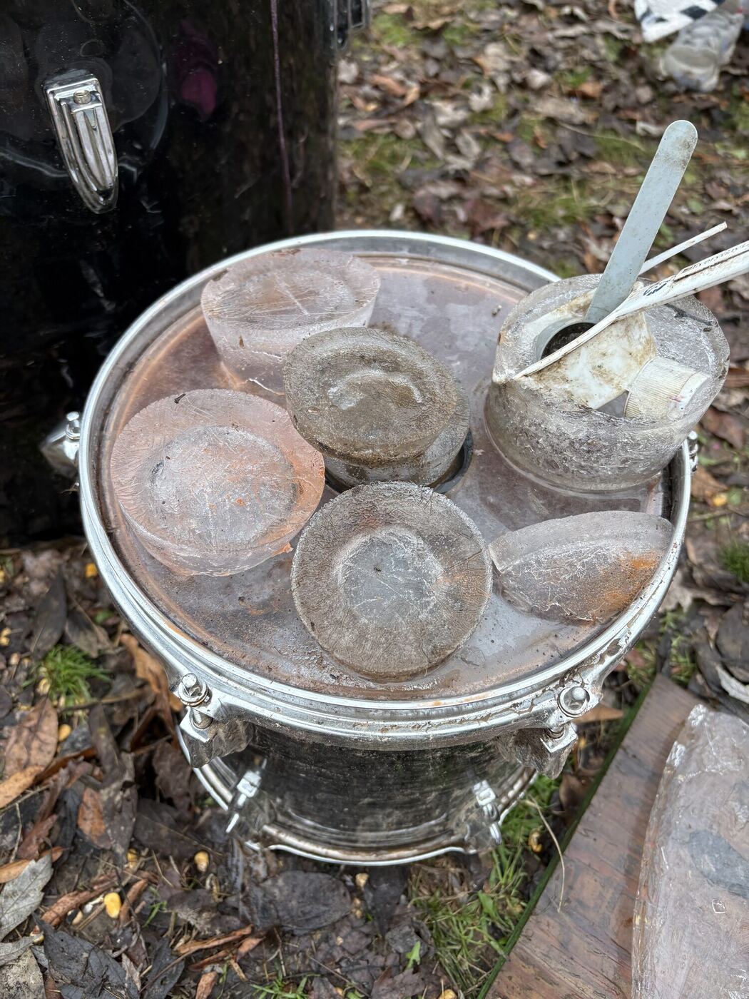 Discs of ice stacked in a metal drum